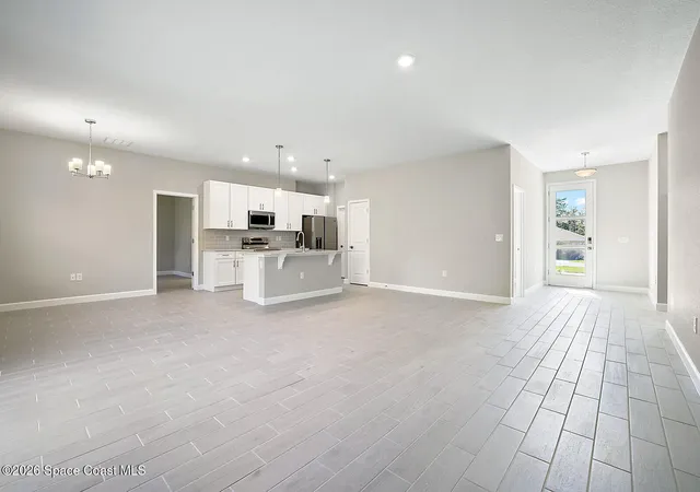 Photo 4 of Single family home for sale at 885 Talmadge Ave SE, Palm Bay, FL 32909 | MLS# 1079613 | Listing updated on 2026-09-19