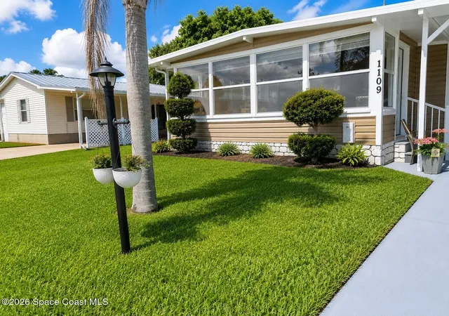 1st image of 1109 Wren Cir E, Barefoot Bay, FL 32976 | MLS# 1080802