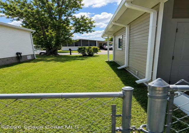 4th image of 1109 Wren Cir E, Barefoot Bay, FL 32976 | MLS# 1080802