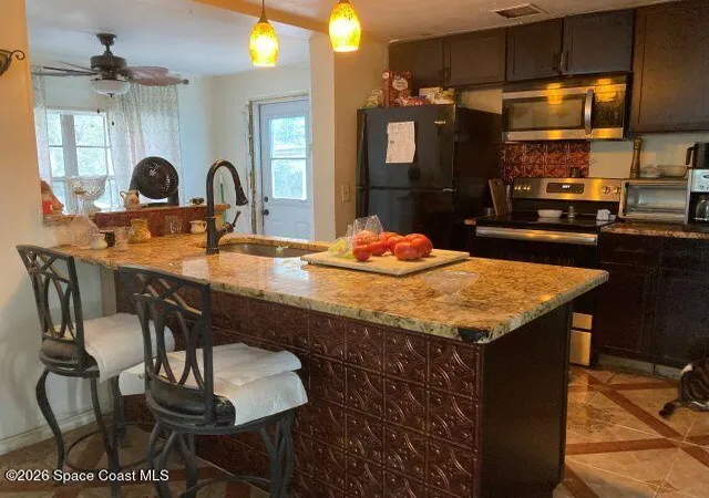 4th image of 5665 N Courtenay Pkwy, Merritt Island, FL 32953 | MLS# 1080967