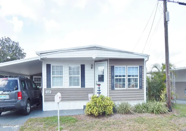 Photo 1 of Manufactured home for sale at 1260 Turkey Crk Dr Ne, Palm Bay, FL 32905 | MLS# 1081193 | Listing updated on 2026-07-01