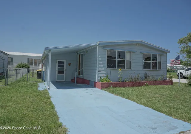 Photo 2 of Manufactured home for sale at 2339 Royal Palm Dr Ne, Palm Bay, FL 32905 | MLS# 1081111 | Listing updated on 2026-08-04