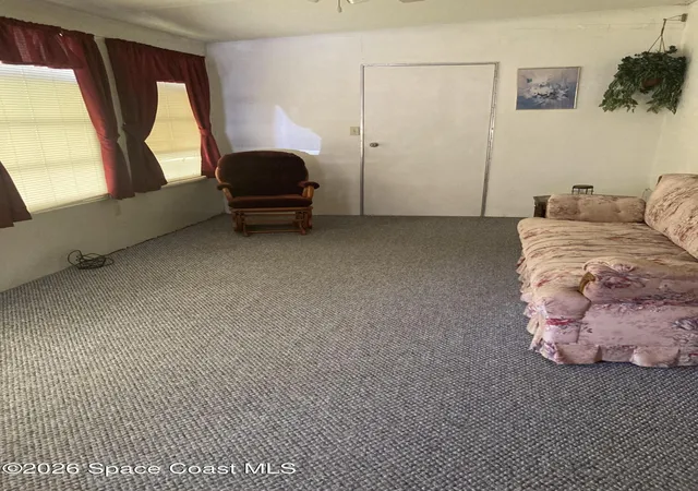 Photo 3 of Manufactured home for sale at 128 Mystic Blvd Ne, Palm Bay, FL 32907 | MLS# 1081692 | Listing updated on 2026-07-18