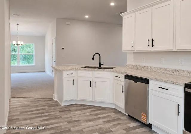 Photo 3 of Single family home for sale at 403 Ja Bombardier Blvd, Palm Bay, FL 32908 | MLS# 1082003 | Listing updated on 2026-10-08