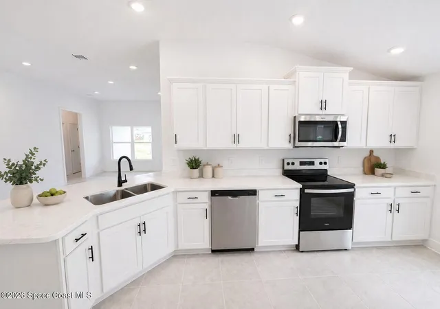 Photo 2 of Single family home for sale at 1386 Kylar Dr Nw, Palm Bay, FL 32907 | MLS# 1082007 | Listing updated on 2026-09-09