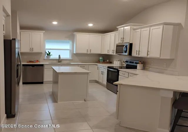 Photo 4 of Sale Pending at 1325 Kylar Dr NW, Palm Bay, FL 32907 | MLS# 1082084 | Listing updated on 2026-09-11