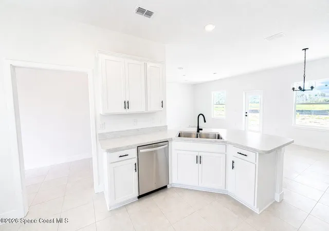 Photo 2 of Single family home for sale at 1256 Kylar Dr Nw, Palm Bay, FL 32907 | MLS# 1082304 | Listing updated on 2026-09-09