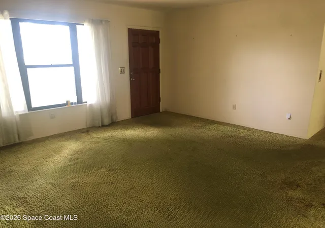Photo 3 of Single family home for sale at 1440 Carr Cir NE, Palm Bay, FL 32905 | MLS# 1085163 | Listing updated on 2026-08-30