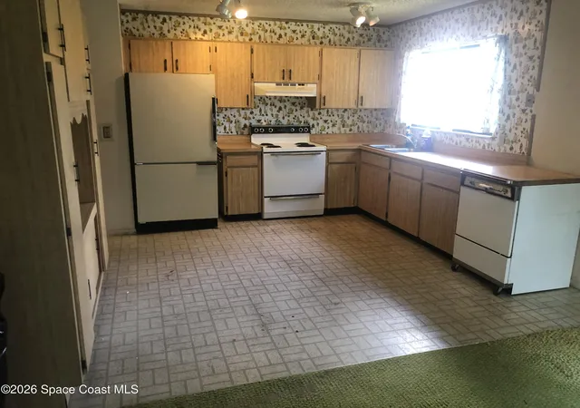 Photo 4 of Single family home for sale at 1440 Carr Cir NE, Palm Bay, FL 32905 | MLS# 1085163 | Listing updated on 2026-08-30