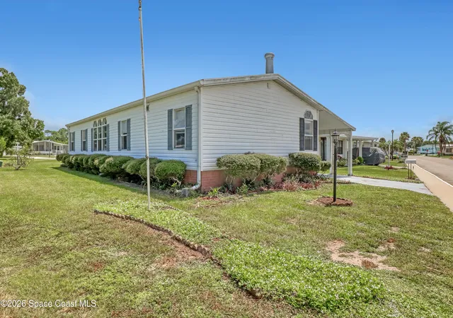 Photo 2 of Manufactured home for sale at 251 Blossom Ln Ne, Palm Bay, FL 32907 | MLS# 1085942 | Listing updated on 2026-09-16