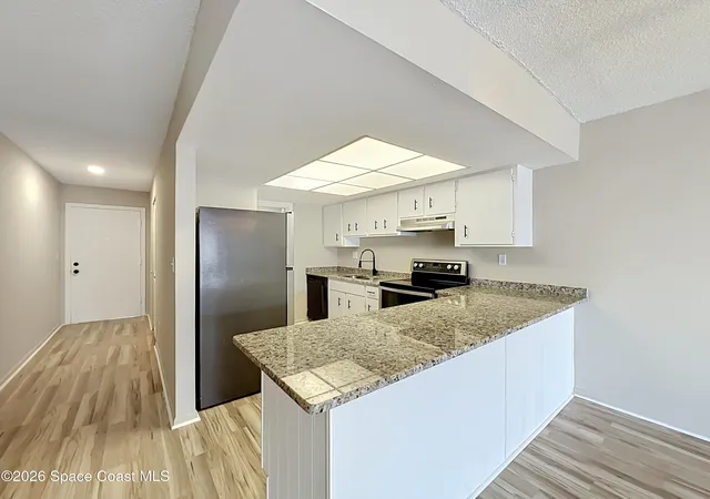 Photo 3 of Condo for sale at 2135 N Courtenay Pkwy #219, Merritt Island, FL 32953 | MLS# 1085694 | Listing updated on 2026-10-06