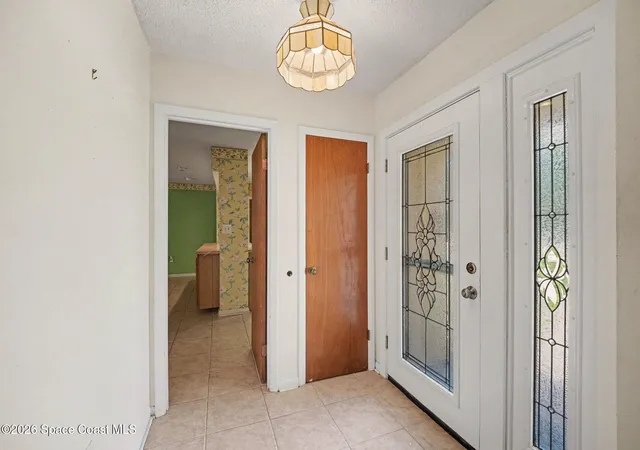 Photo 3 of Sale Pending at 1200 Palmdale Cir Ne, Palm Bay, FL 32905 | MLS# 1085802 | Listing updated on 2026-08-25