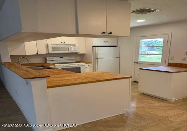 Photo 3 of Single family home for sale at 1506 Sea Breeze Ln, Melbourne, FL 32935 | MLS# 1086088 | Listing updated on 2026-09-17