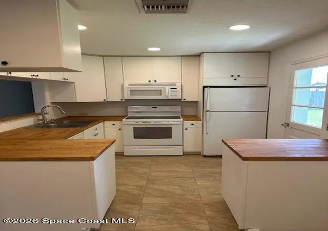 Photo 3 of Single family home for sale at 1506 Sea Breeze Ln, Melbourne, FL 32935 | MLS# 1086088 | Listing updated on 2026-09-17