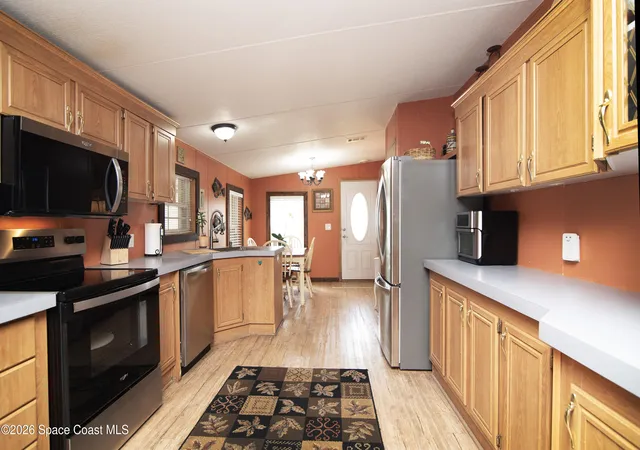 Photo 2 of Manufactured home for sale at 416 Plover Dr, Barefoot Bay, FL 32976 | MLS# 1085954 | Listing updated on 2026-09-17