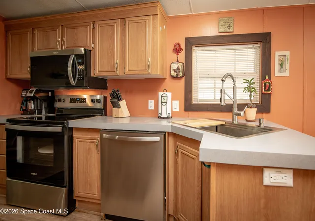 Photo 3 of Manufactured home for sale at 416 Plover Dr, Barefoot Bay, FL 32976 | MLS# 1085954 | Listing updated on 2026-09-17
