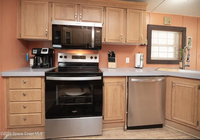 Photo 4 of Manufactured home for sale at 416 Plover Dr, Barefoot Bay, FL 32976 | MLS# 1085954 | Listing updated on 2026-09-23