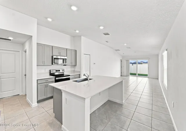 Photo 2 of Single family home for sale at 1407 Colebrook Cir Sw, Palm Bay, FL 32908 | MLS# 1086195 | Listing updated on 2026-09-04