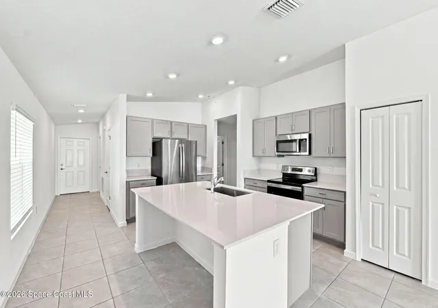 Photo 3 of Single family home for sale at 1407 Colebrook Cir Sw, Palm Bay, FL 32908 | MLS# 1086195 | Listing updated on 2026-09-04