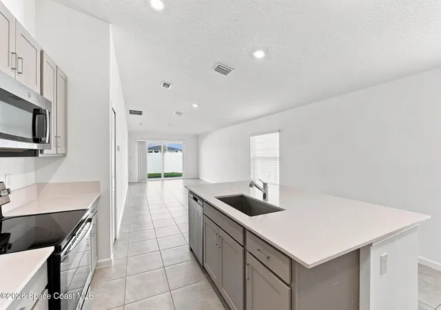 Photo 3 of Single family home for sale at 1407 Colebrook Cir Sw, Palm Bay, FL 32908 | MLS# 1086195 | Listing updated on 2026-09-04