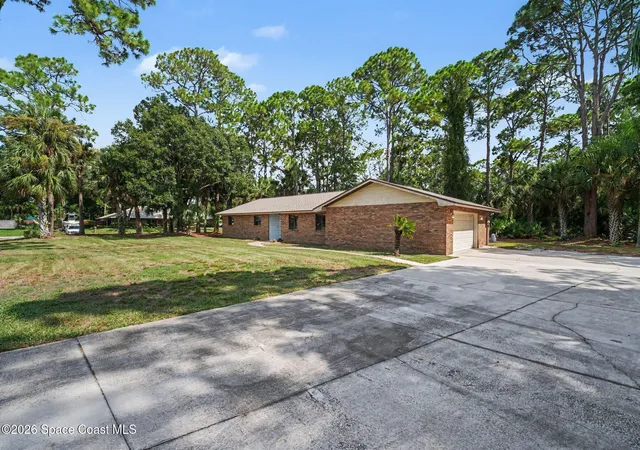 Photo 3 of Single family home for sale at 8001 Pine Needle Ln, West Melbourne, FL 32904 | MLS# 1086208 | Listing updated on 2026-09-01