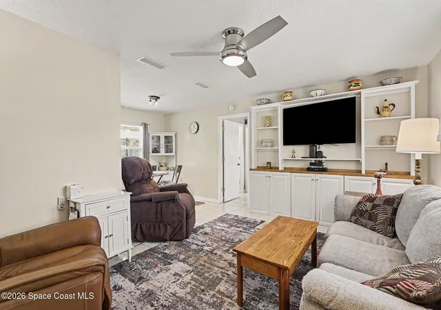 Photo 3 of Single family home for sale at 1300 Cozy Ct Nw, Palm Bay, FL 32907 | MLS# 1086084 | Listing updated on 2026-09-17