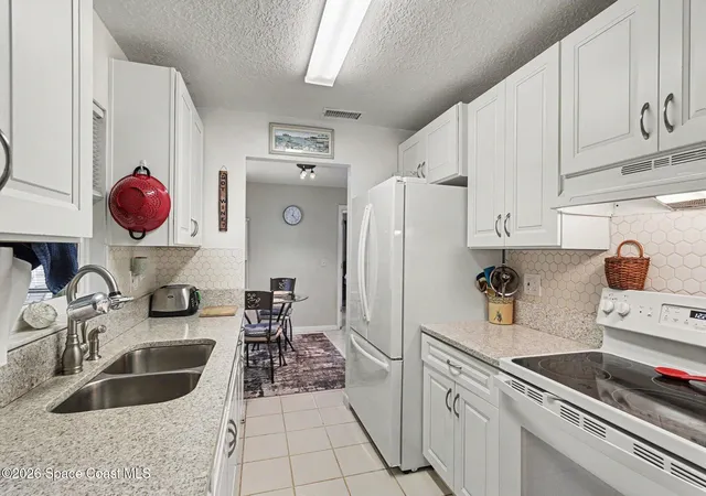 Photo 3 of Single family home for sale at 1300 Cozy Ct Nw, Palm Bay, FL 32907 | MLS# 1086084 | Listing updated on 2026-09-17