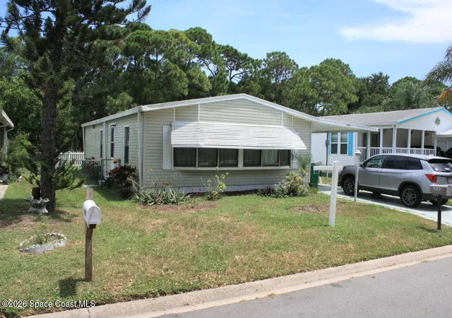 Photo 1 of Manufactured home for sale at 435 Egret Cir, Barefoot Bay, FL 32976 | MLS# 1086085 | Listing updated on 2026-08-28