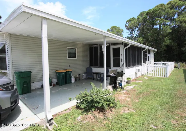 Photo 3 of Manufactured home for sale at 435 Egret Cir, Barefoot Bay, FL 32976 | MLS# 1086085 | Listing updated on 2026-08-28