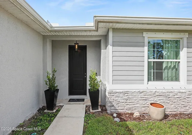 Photo 3 of Sale Pending at 560 Topeka Rd SW, Palm Bay, FL 32908 | MLS# 1086347 | Listing updated on 2026-09-04