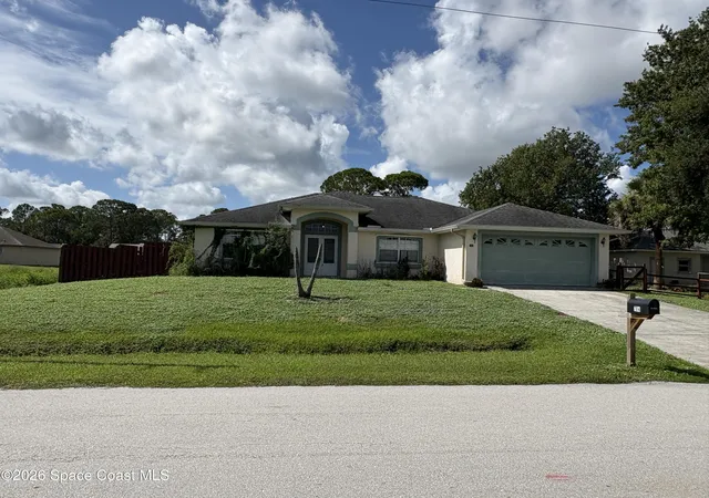 Photo 3 of Sale Pending at 704 Elmont St Nw, Palm Bay, FL 32907 | MLS# 1086180 | Listing updated on 2026-09-01