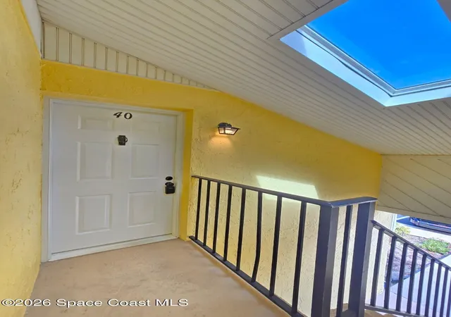 Listing Photo 3 - Condo for sale in building located at 596 N Wickham Rd, Melbourne, FL 32935 - Unit #40