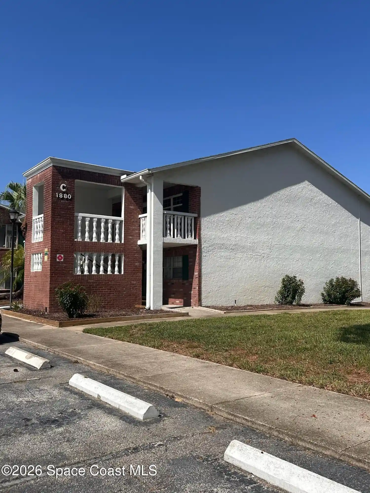 Listing Photo 1 - Condo for sale in 1880 Knox Mcrae Dr located at 1880 Knox Mcrae Dr, Titusville, FL 32780 - Unit #201c