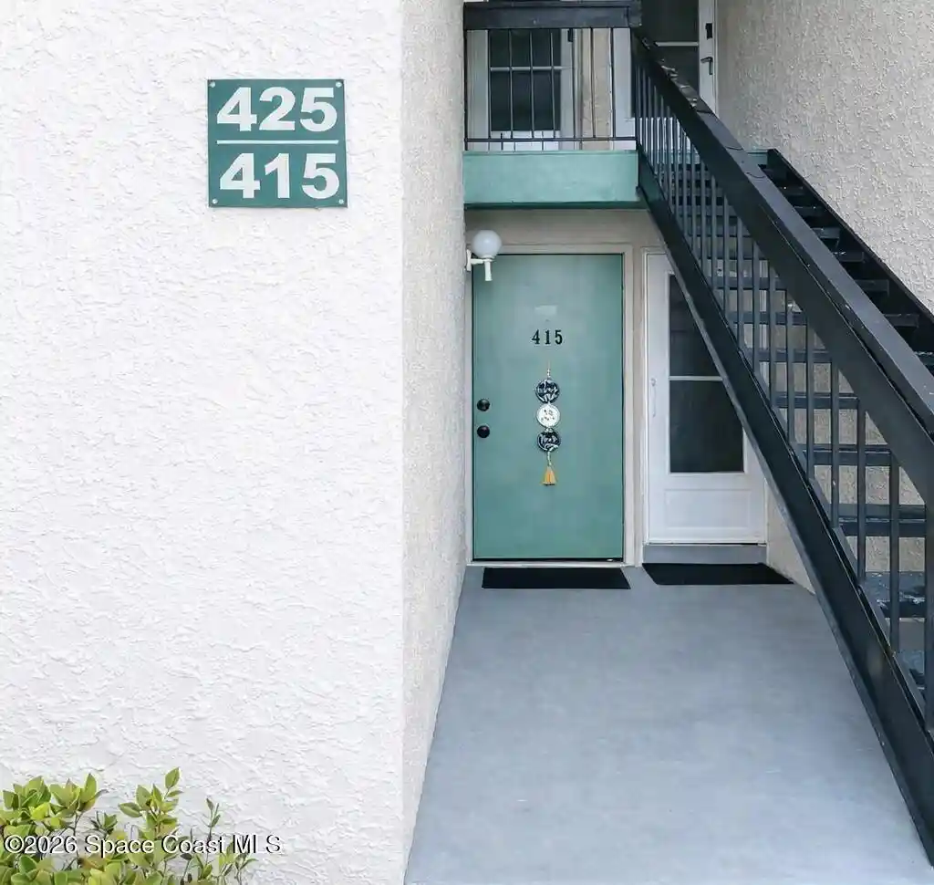 Listing Photo 1 - Condo for sale in 1225 N Wickham Rd located at 1225 N Wickham Rd, Melbourne, FL 32935 - Unit #415