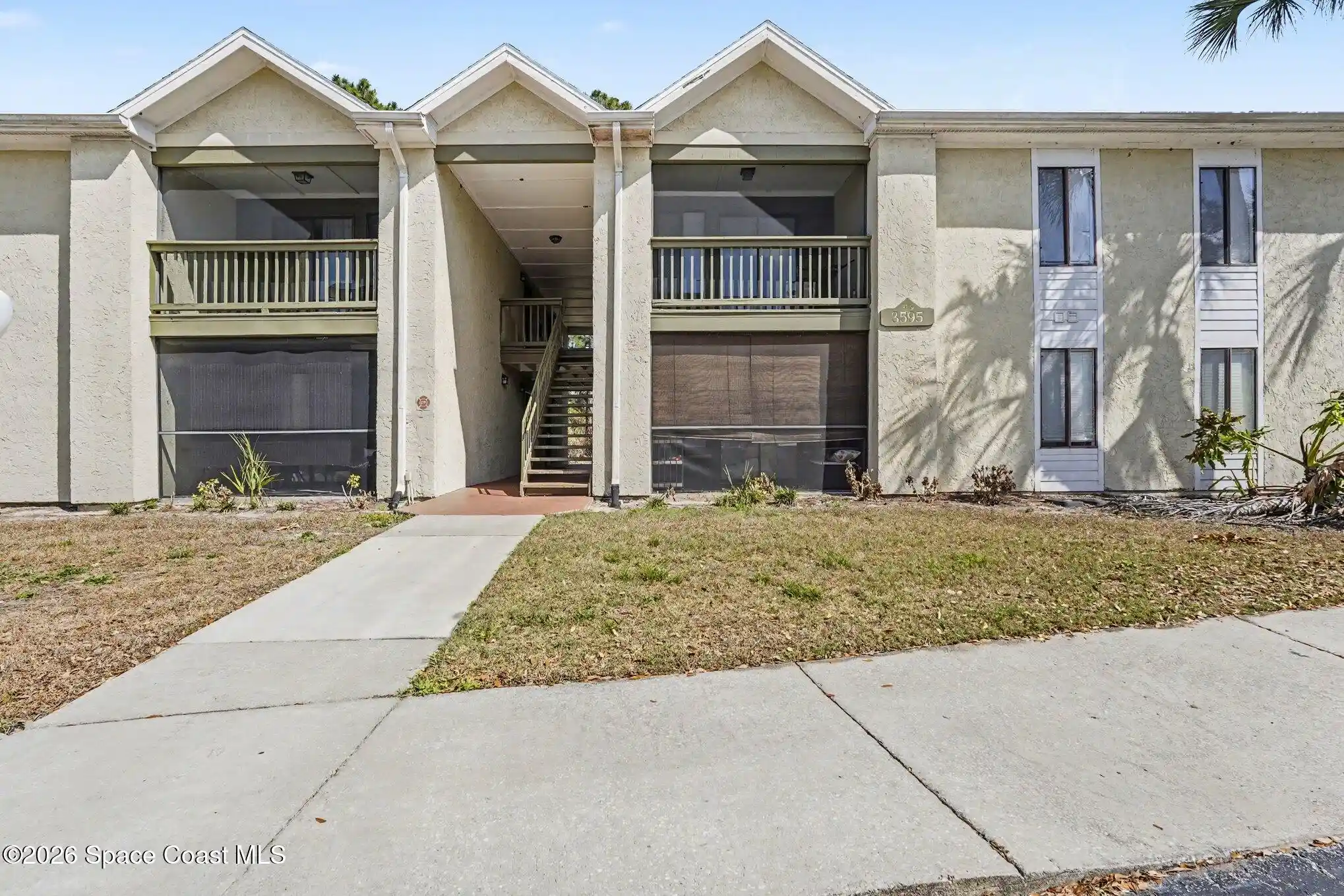 Listing Photo 1 - Condo for sale in 3595 Sable Palm Ln located at 3595 Sable Palm Ln, Titusville, FL 32780 - Unit 3595 Sable Palm Ln