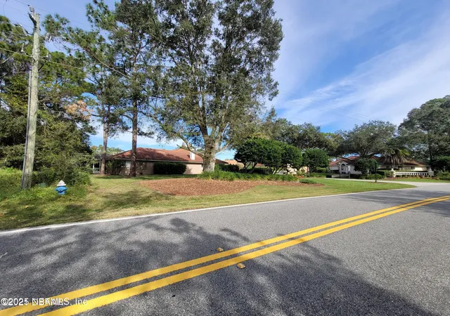 Photo 2 of Land for sale at 309 Wellington Dr, Palm Coast, FL 32164 | MLS# 2096467 | Listing updated on 2026-07-24