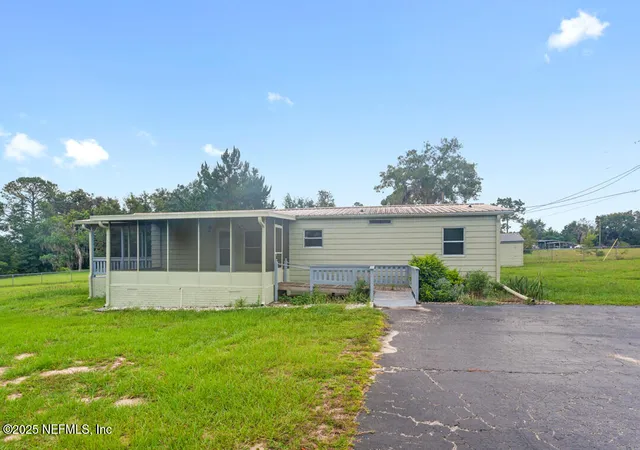 1st image of 100 Mangels Dr, Interlachen, FL 32148 | MLS# 2103081