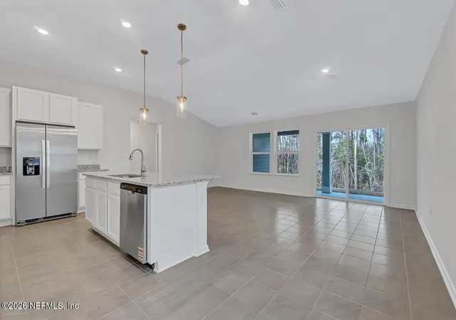 Photo 2 of Single family home for sale at 718 Panther Lake Pkwy, Jacksonville, FL 32221 | MLS# 2104647 | Listing updated on 2026-09-17