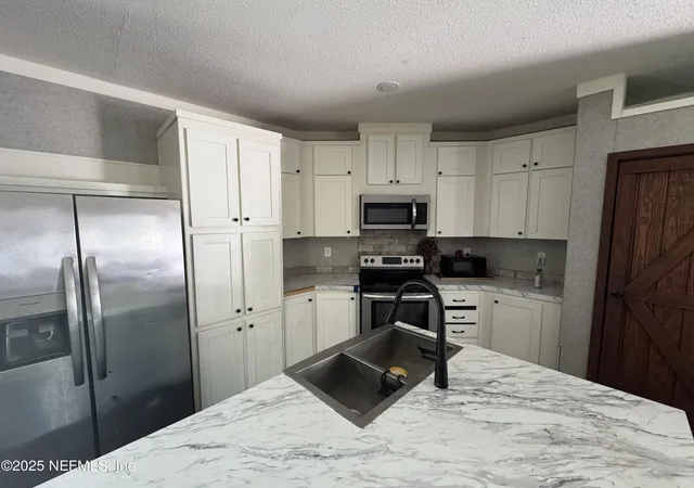 Homes for sale in Florahome, FL | 118 Lariat Dr, Florahome, FL 32140 | MLS# 2104673