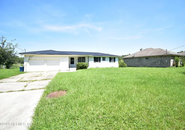 4th image of 3037 Ribault Scenic Dr, Jacksonville, FL 32208 | MLS# 2106011