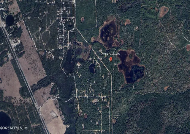 Photo 3 of Land for sale at 128 N Carolina Dr, Satsuma, FL 32189 | MLS# 2110318 | Listing updated on 2026-03-23