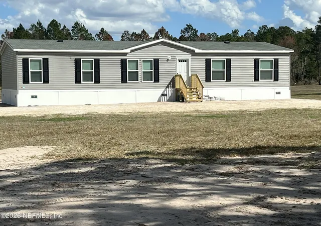 Photo 2 of Manufactured home for sale at 22517 Baxter Rd, Sanderson, FL 32087 | MLS# 2126681 | Listing updated on 2026-10-01