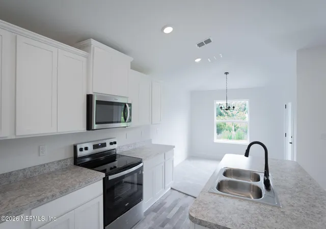Photo 4 of Single family home for sale at 8357 Helmsley Blvd, Jacksonville, FL 32219 | MLS# 2129127 | Listing updated on 2026-09-18