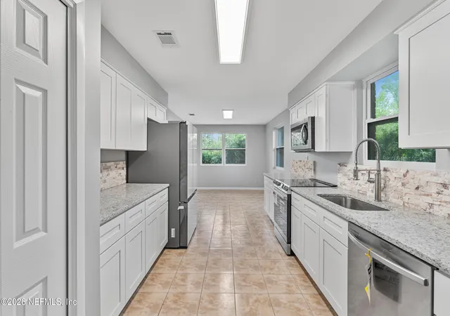 Photo 3 of Single family home for sale at 688 Claire Ln, Orange Park, FL 32073 | MLS# 2130127 | Listing updated on 2026-02-23