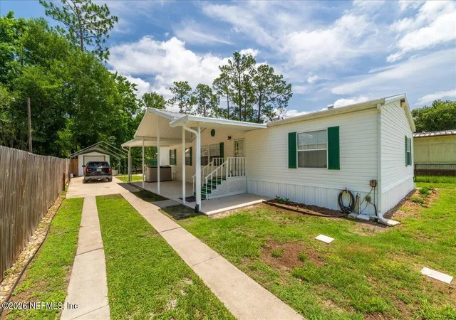 Photo 2 of Manufactured home for sale at 120 Waterway Ave, Satsuma, FL 32189 | MLS# 2133192 | Listing updated on 2026-07-03