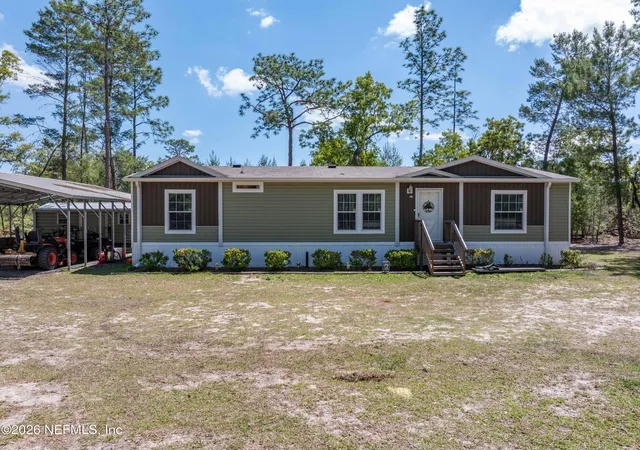 Photo 1 of Manufactured home for sale at 221 Magnolia Rd, Hawthorne, FL 32640 | MLS# 2138767 | Listing updated on 2026-06-30