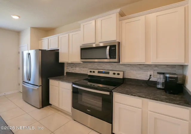 Photo 3 of Townhouse for sale at 648 Yellow Oaks Ln, Orange Park, FL 32065 | MLS# 2144015 | Listing updated on 2026-08-24