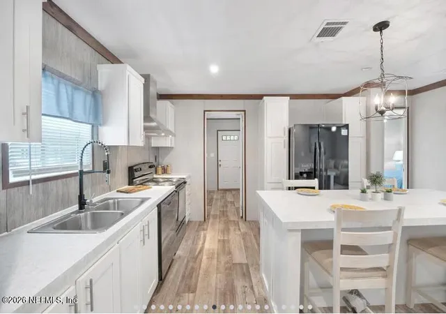 Photo 4 of Manufactured home for sale at 140 Islander Rd, Satsuma, FL 32189 | MLS# 2146603 | Listing updated on 2026-09-07