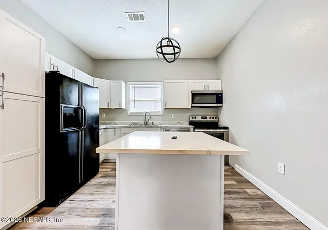 Photo 3 of Sale Pending at 1680 8th Street W, Jacksonville, FL 32209 | MLS# 2147187 | Listing updated on 2026-08-25