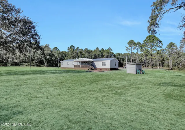 Photo 1 of Manufactured home for sale at 141 Woods Rd, San Mateo, FL 32187 | MLS# 2147834 | Listing updated on 2026-06-20